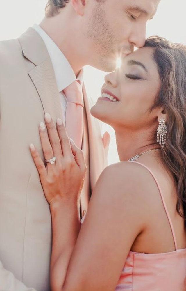 Sreejita opted for a strappy pink dress while Michael wore a suit with a pink tie