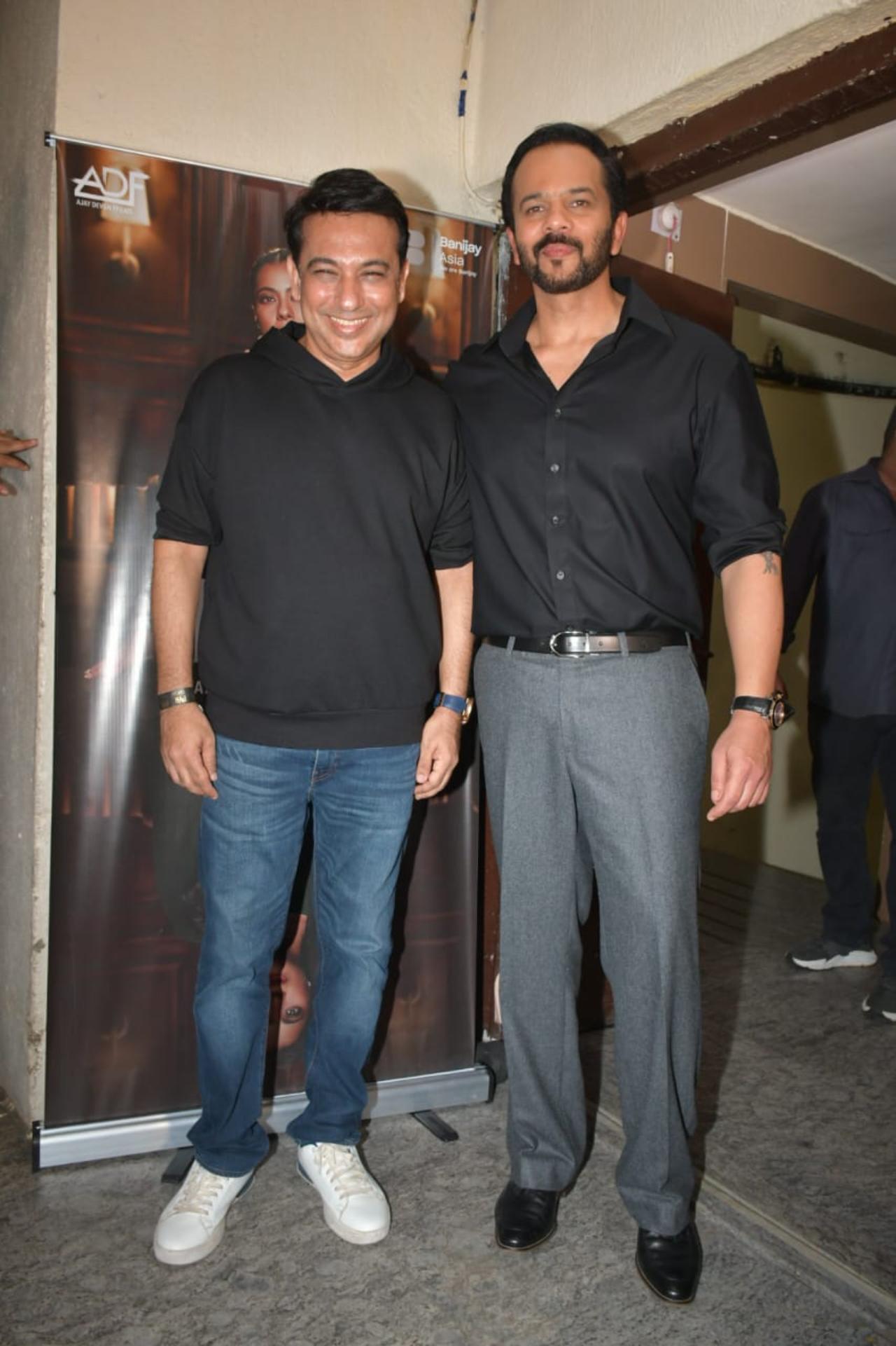 Dressed in a black shirt and grey pants, Shetty happily posed for the paparazzi on the red carpet and also while entering the theatre