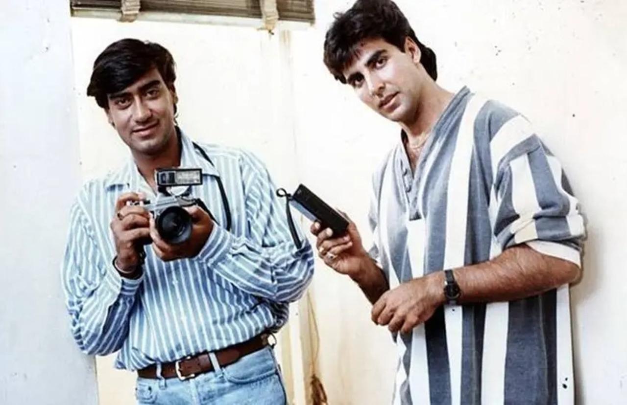 Suhaag (1994) 
College friends Ajay and Raj always play pranks on each other and then get into trouble. One day, Ajay needs his birth certificate for his passport, but he is shocked to find out his real name