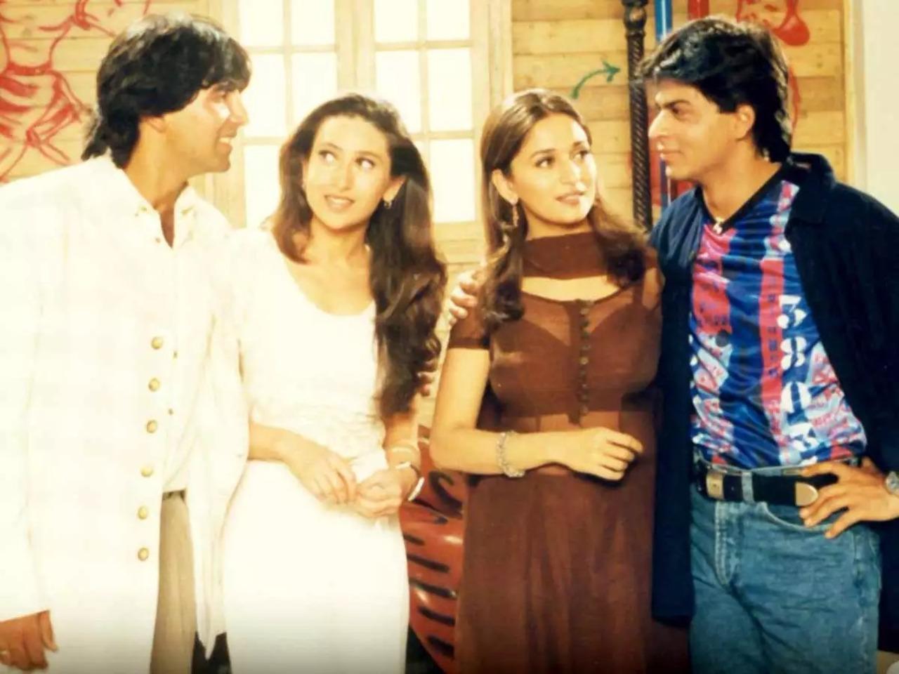 Dil To Pagal Hai (1997)
Rahul (Shah Rukh Khan) runs a dance troupe of which Nisha (Karisma Kapoor) is a part. While Nisha secretly is in love with him, he falls for Pooja (Madhuri Dixit). While it's a romantic tale, the film beautifully portrays the friendship between Nisha and Rahul, and Pooja and Ajay (Akshay Kumar)