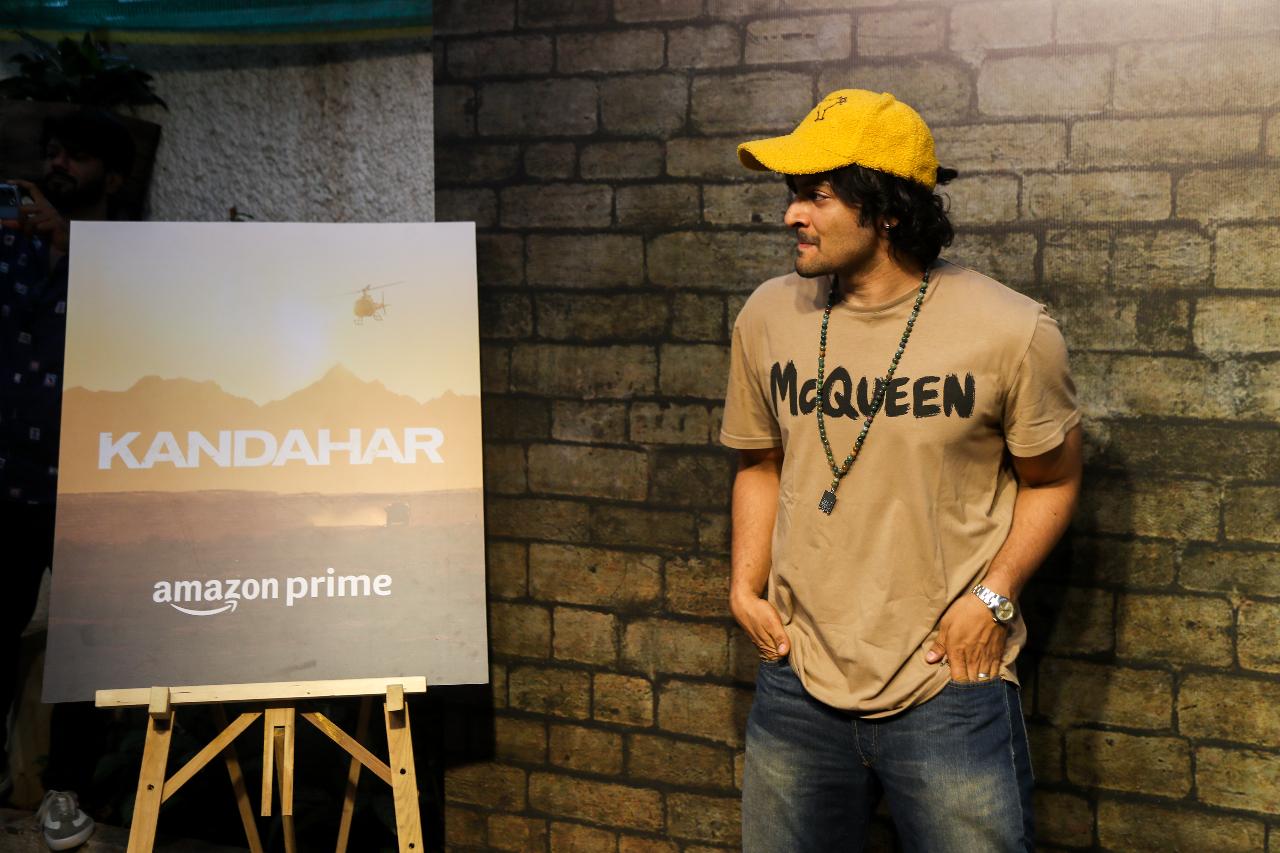 Ali Fazal was casually dressed in a beige T-shirt and jeans as he modestly posed next to the Kandahar release poster. Perhaps, blending into his role of undercover intelligence agent!