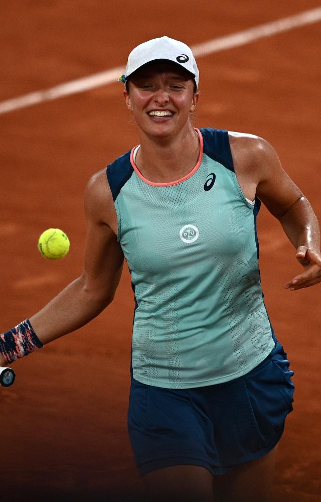 Iga Swiatek claimed her second French Open title, defeating Coco Gauff 6-1, 6-3.