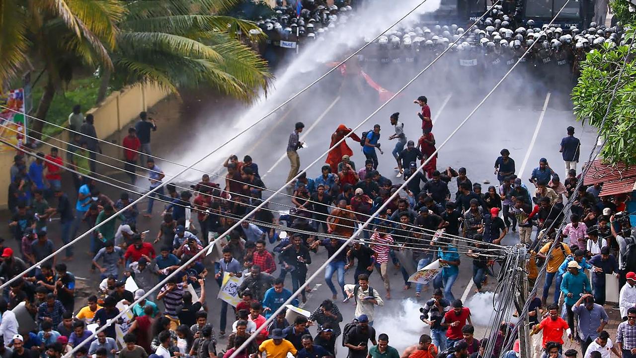 Police use tear gas and water cannons to disperse the gathering.