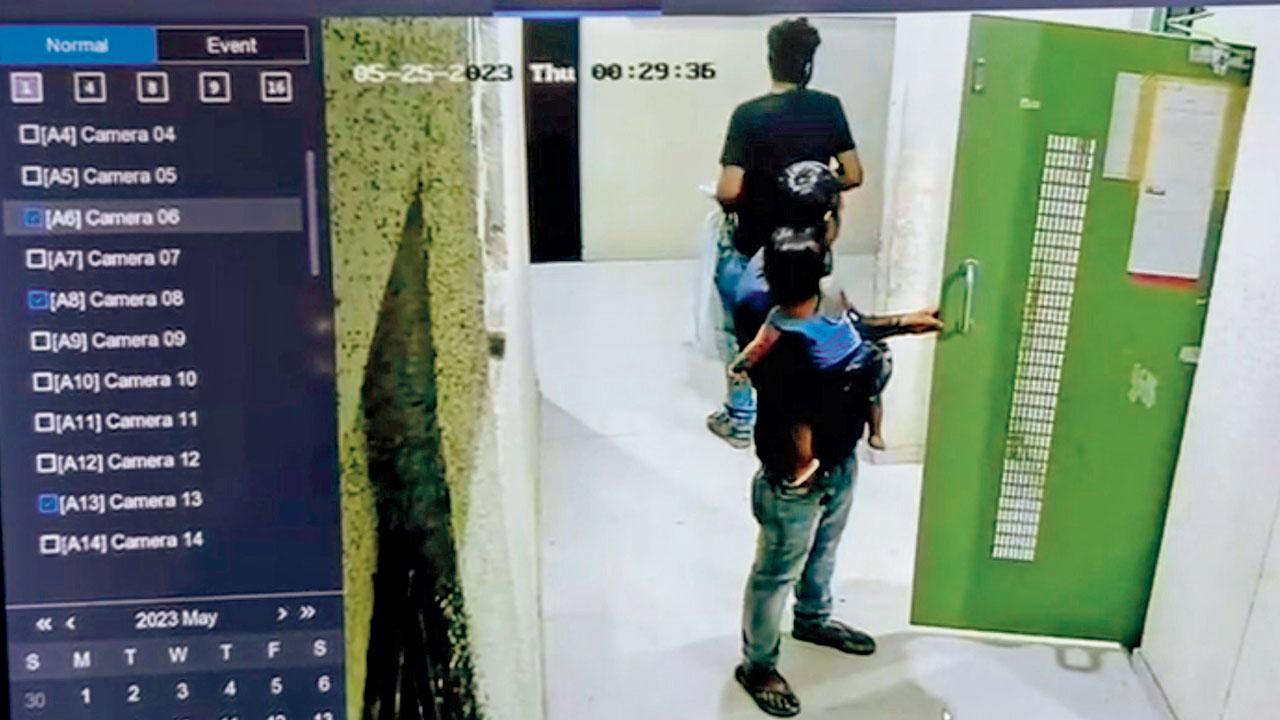 A still of CCTV footage in which the killer, his brother and son are seen on their way to dispose of the body on May 25. Pics/Hanif Patel