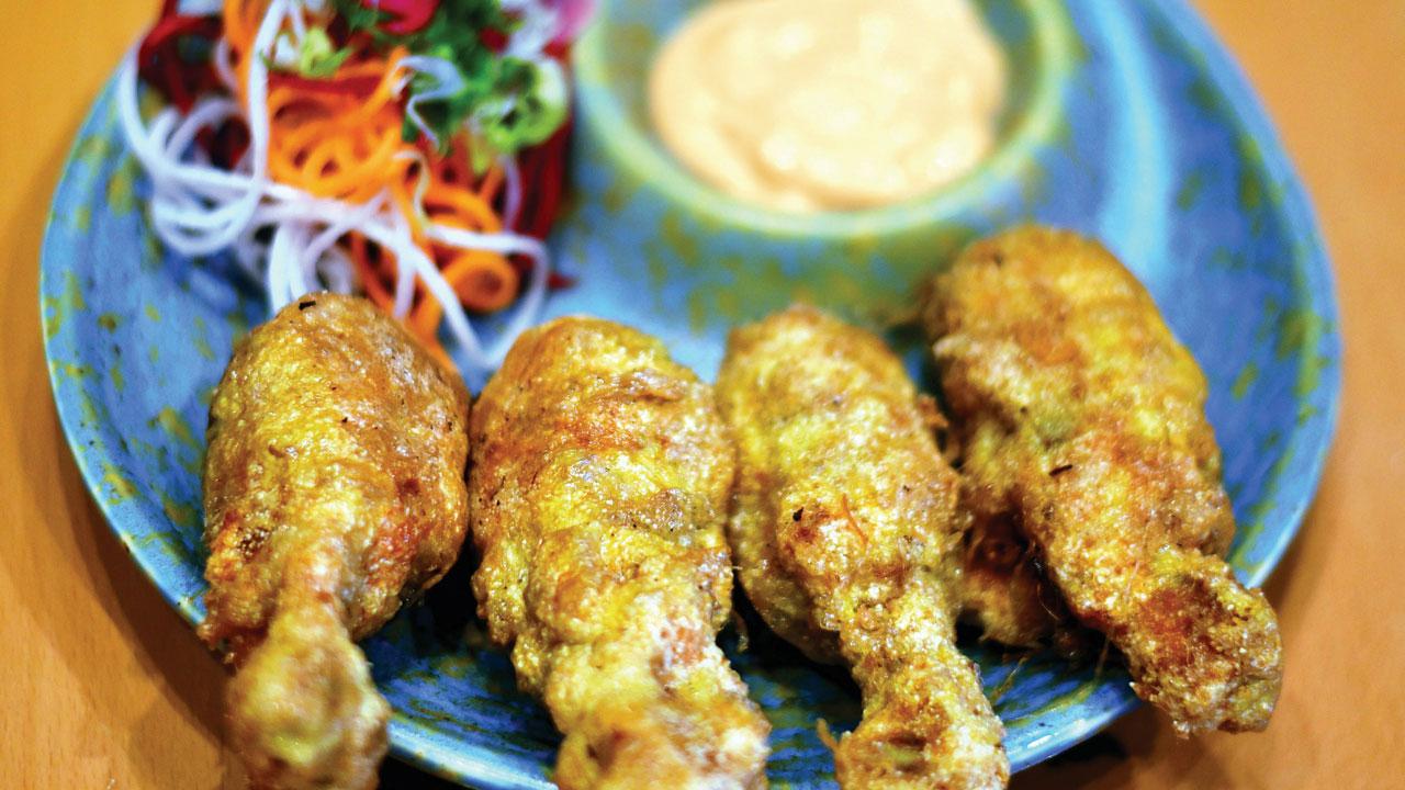 Chicken farcha A Parsi style drumstick comes laced with egg. The chicken is semi-precooked and marinated and finished in the fryer.