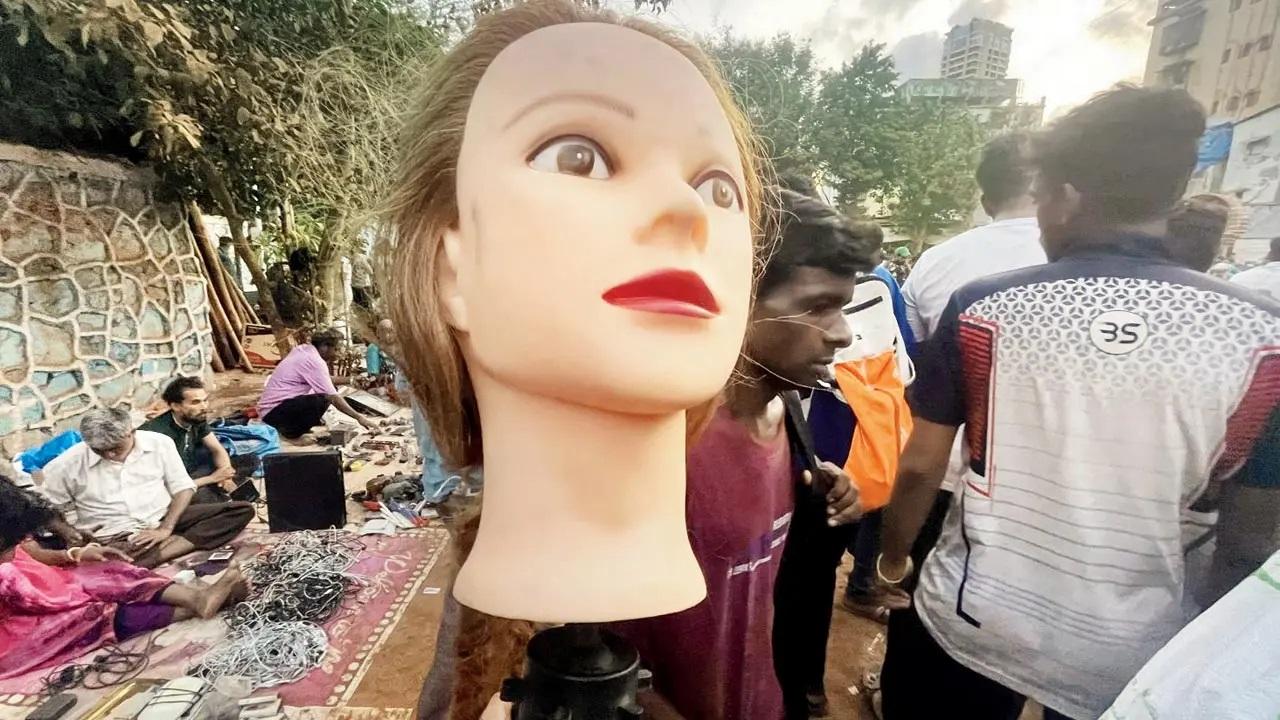 Mannequin heads found at Chor Bazaar's Friday dawn market are used for make-up trials. A man bought the head of a mannequin as a gift for his sister to practice her make-up artistry skills because she owns a beauty parlour.