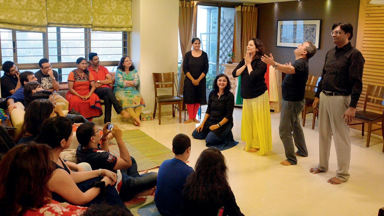Participants engage in exercises at previous workshops