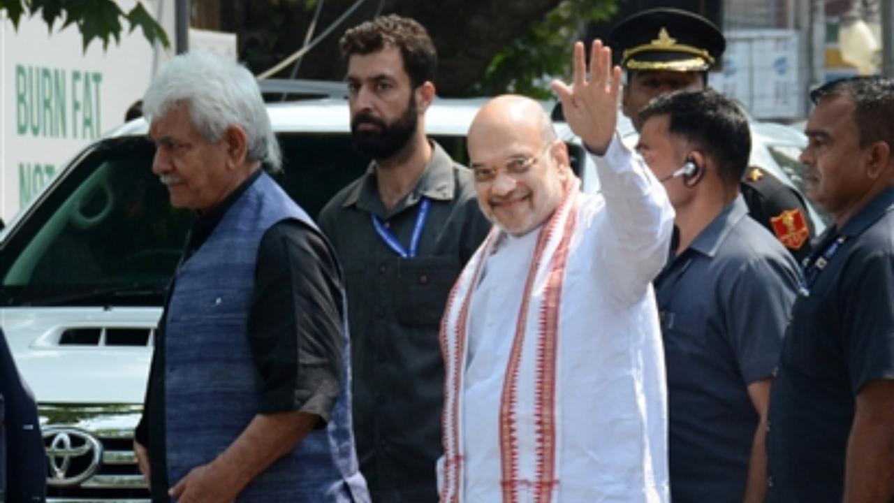 Union Home Minister Amit Shah arrives to lay the foundation stone of 'Balidan Stambh' at Pratap Park (Pic/PTI)