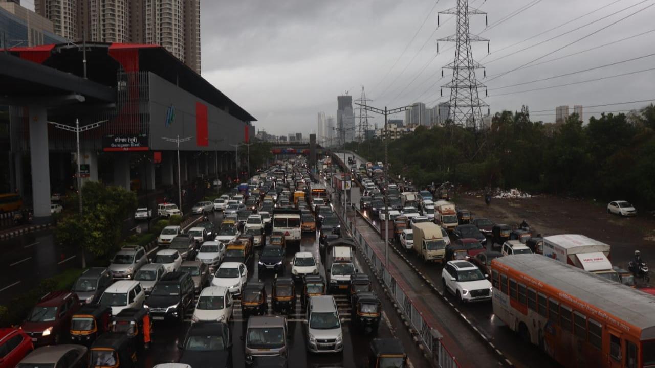 IN PHOTOS: Traffic hit on Western Express Highway due to rains in Mumbai