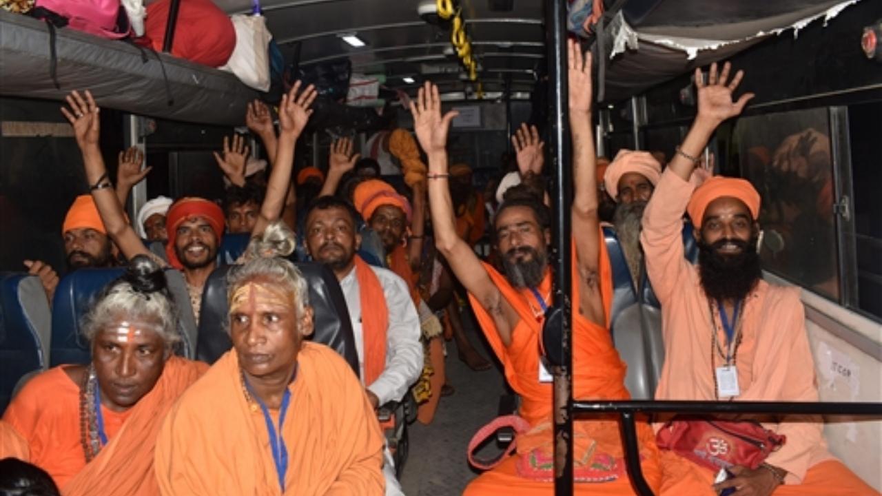 Five counters have been established for the tatkal registration of the pilgrims at Vaishnavi Dham, Mahajan Sabha, Panchayat Ghar and two at Geeta Bhawan and Ram Mandir for the registration of saints
In Pic: Sadhua shout religious slogans after boarding a bus as the first batch of pilgrims leaves for the Amarnath Yatra
 