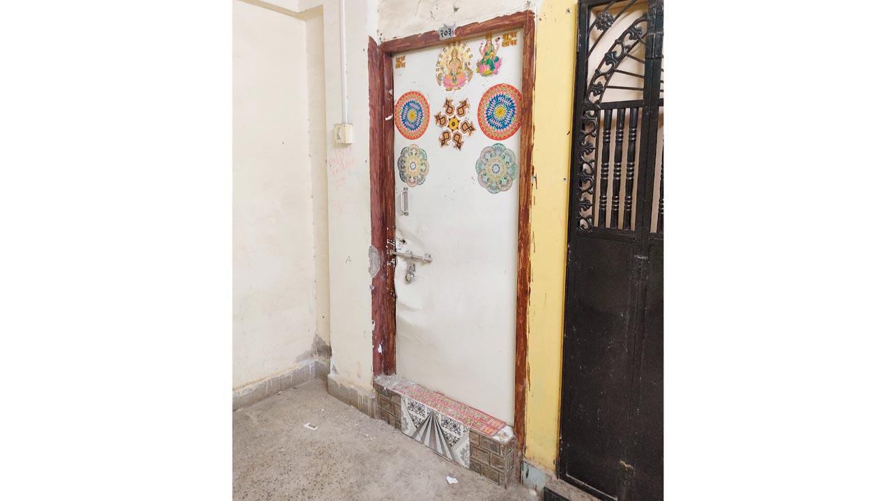 The apartment door which was broken down by the fire brigade
