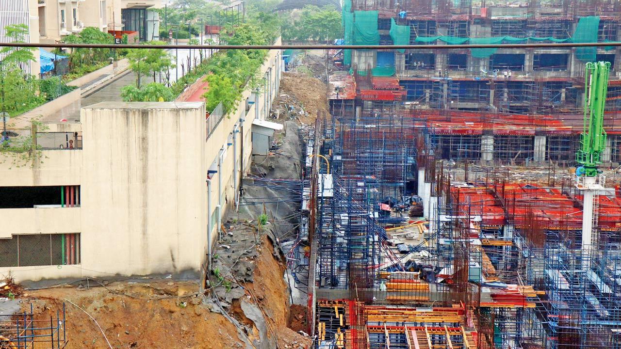 The exposed edges of a residential society on Tuesday, following the mudslide. Pic/Anurag Ahire