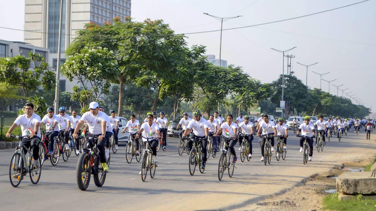 People participate in a cycle rally organised by CRPF on World Environment Day, in Gurugram. Pic/PTI