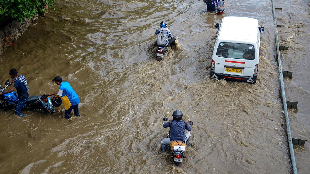 The onset of monsoon brings both relief and challenges to the residents of Gurugram, with heavy rainfall leading to waterlogged streets and disrupted commute.