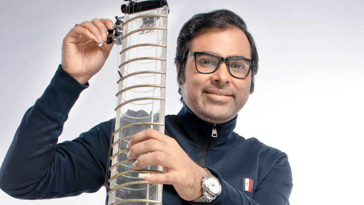 Chatterjee with his creation, the electric see-tar