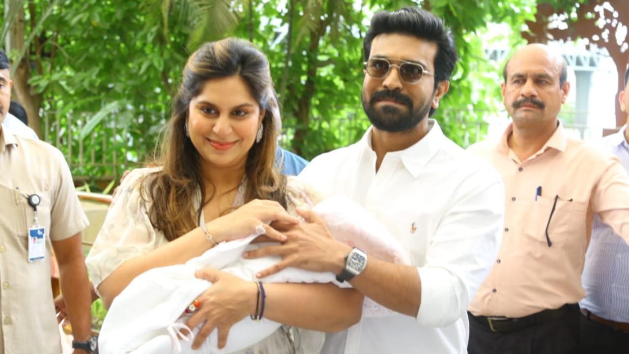 First Pics! Ram, Upasana make first public appearance with daughter