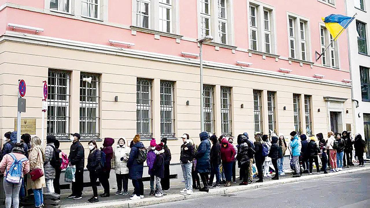 People outside the Ukrainian embassy in Berlin. Pic/AP