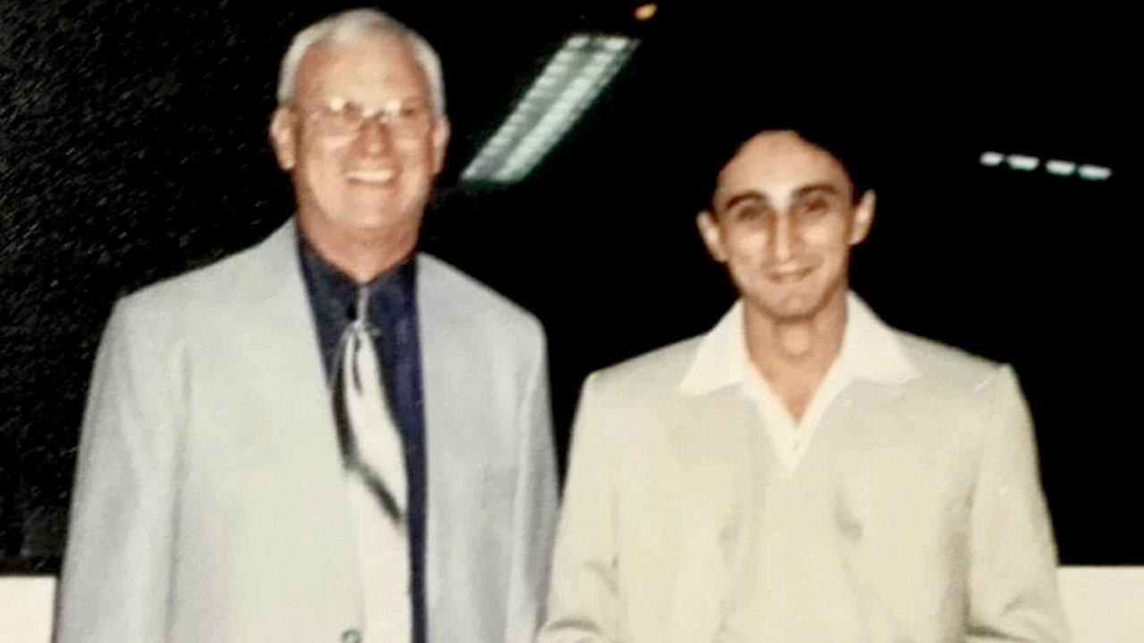 Khan and his boss Terry  Brewer in Mumbai in 2000