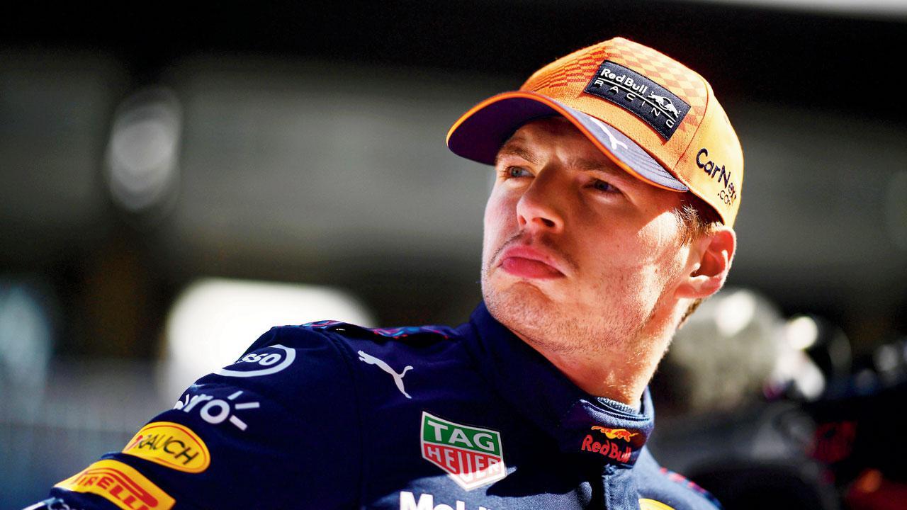 Verstappen hails team after slippery pole win