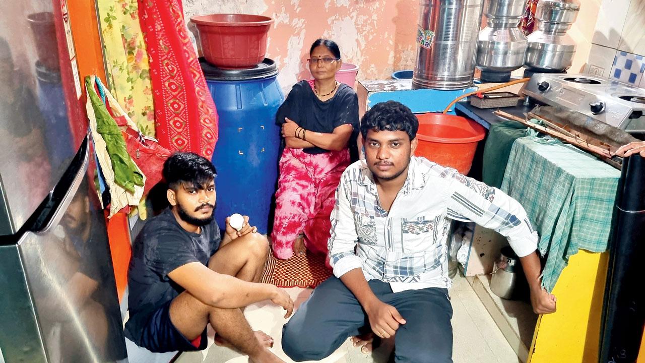 Aakash Narwade (left), Ranjana and a friend, who helped the family find a temporary house in Suryanagar