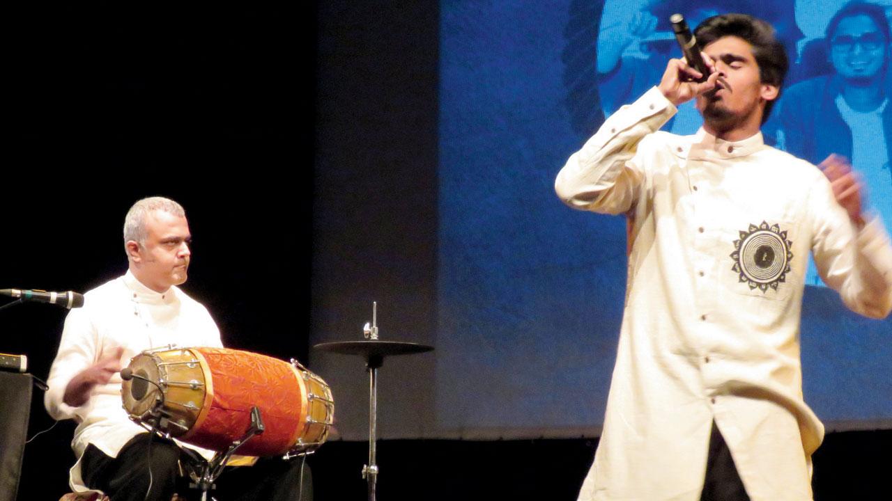 (From left) Viveick Rajagopalan with MC Khoj at a performance