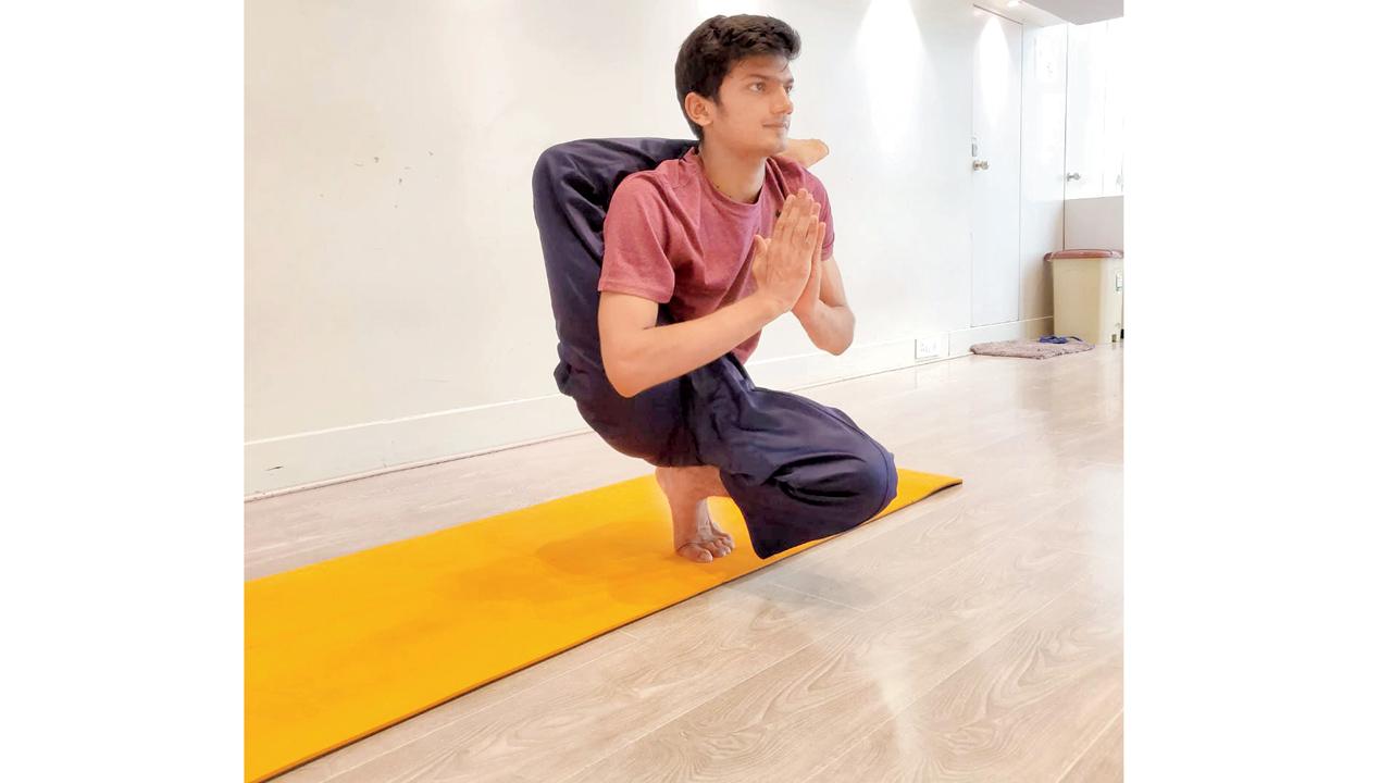 Patel performs an asana