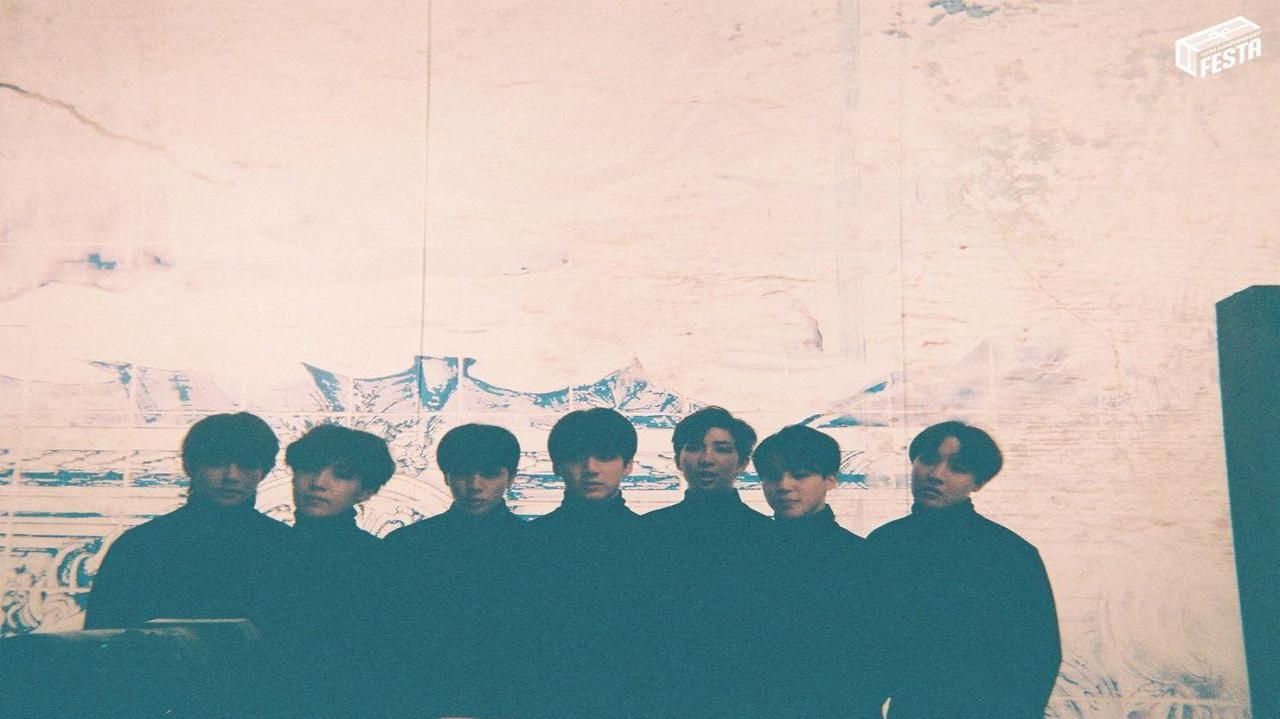 Here, the boys are dressed in chic all-black attire and silhouetted against a mountain-like backdrop – perhaps signifying the dangerous path they have journeyed so far; and how much further they still have to go (Weverse)