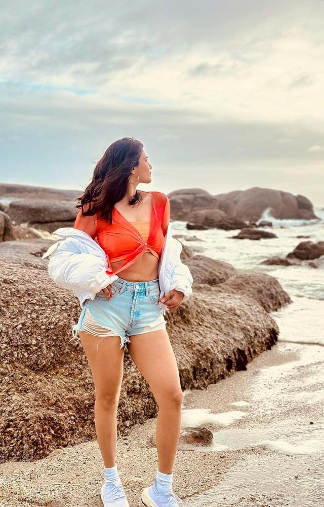 The actress is ensuring she`s her stylish best on the show, as she strikes a pose by the sea