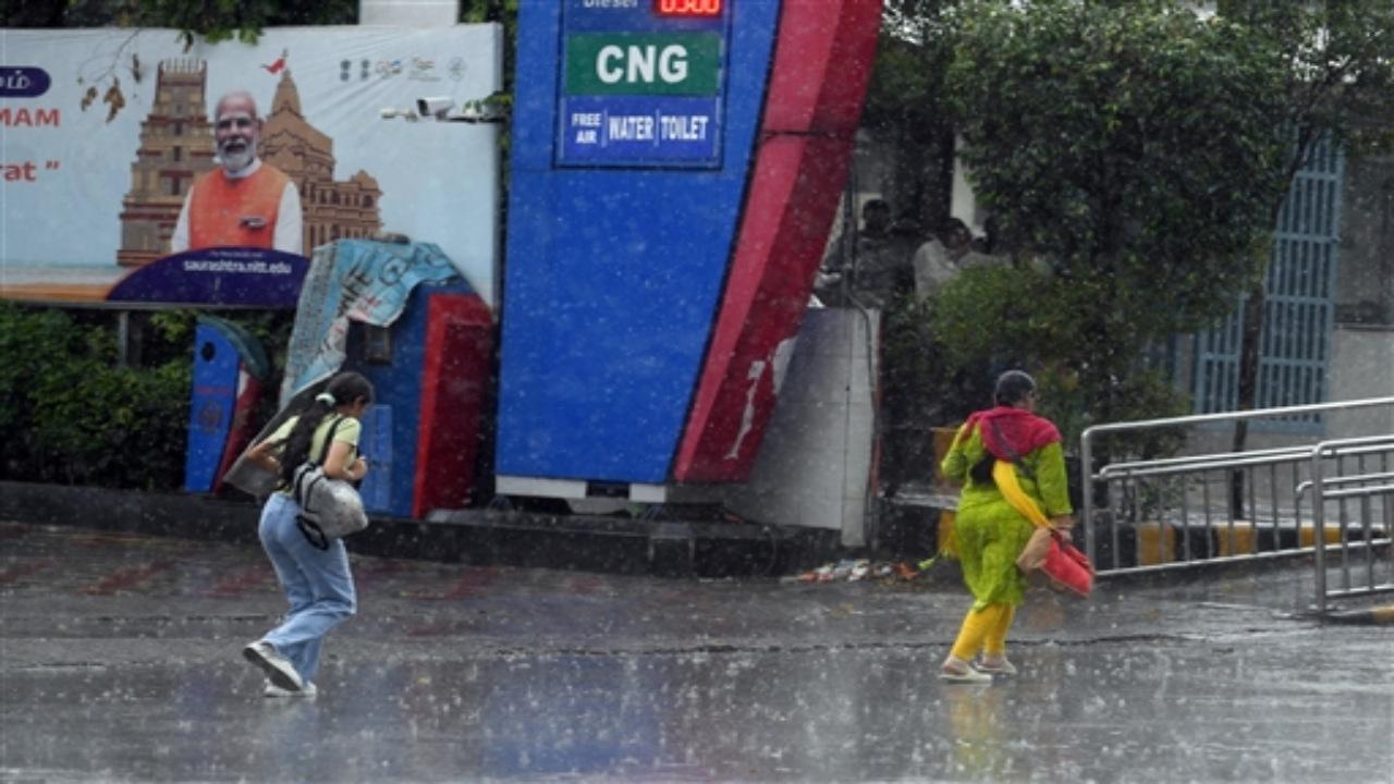 In Photos: Rain in parts of Delhi due to Cyclone Biparjoy
