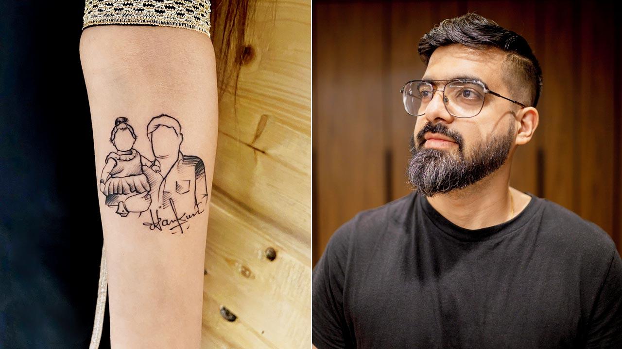 A father-daughter tattoo with the dad’s signature. Pic courtesy/Aliens Tattoo