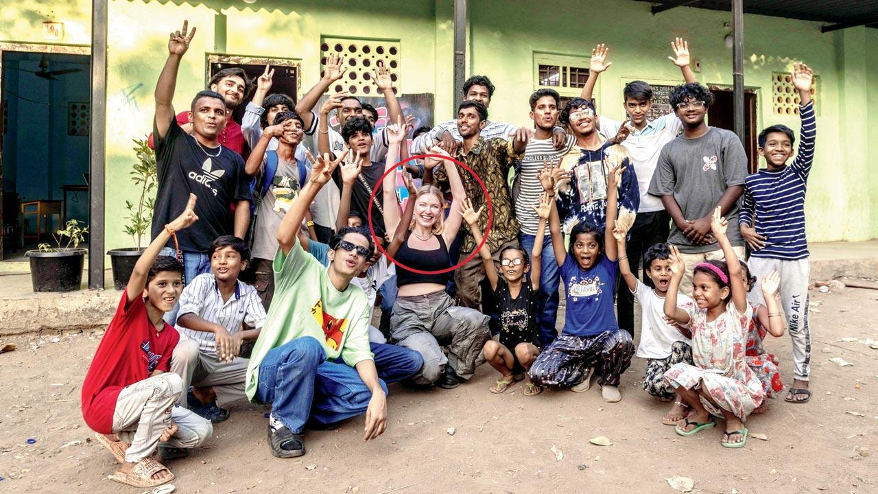 Astrid with the children at The Dharavi Dream Project school