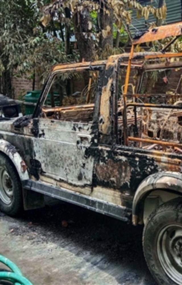 A charred vehicle at Union Minister of State for External Affairs R K Ranjan Singh’s residence
