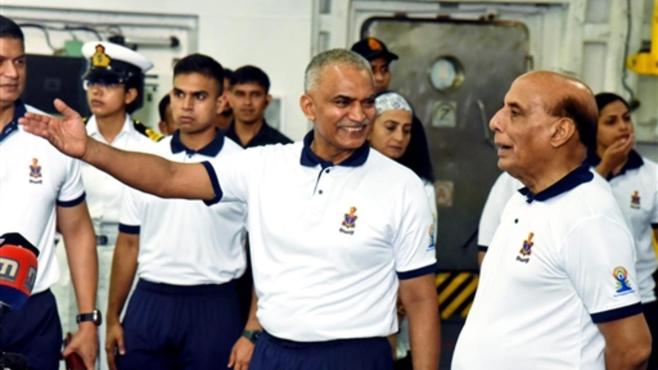 Defence Minister Rajnath Singh with Chief of Naval Staff Admiral R Hari Kumar onboard INS Vikrant
 
