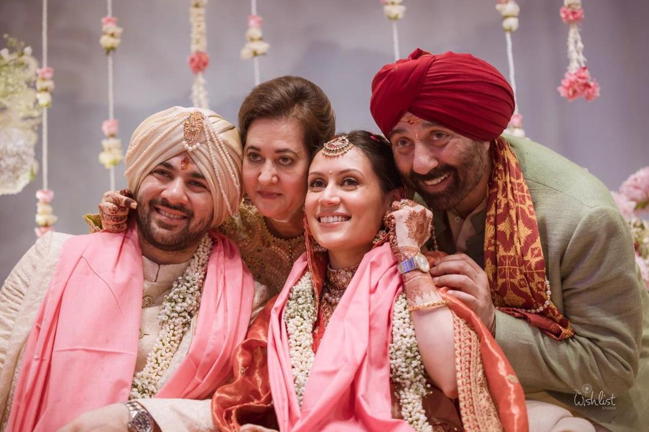 In another picture, Karan and his wife Drisha Acharya could be seen posing with Sunny Deol and his wife Pooja Deol