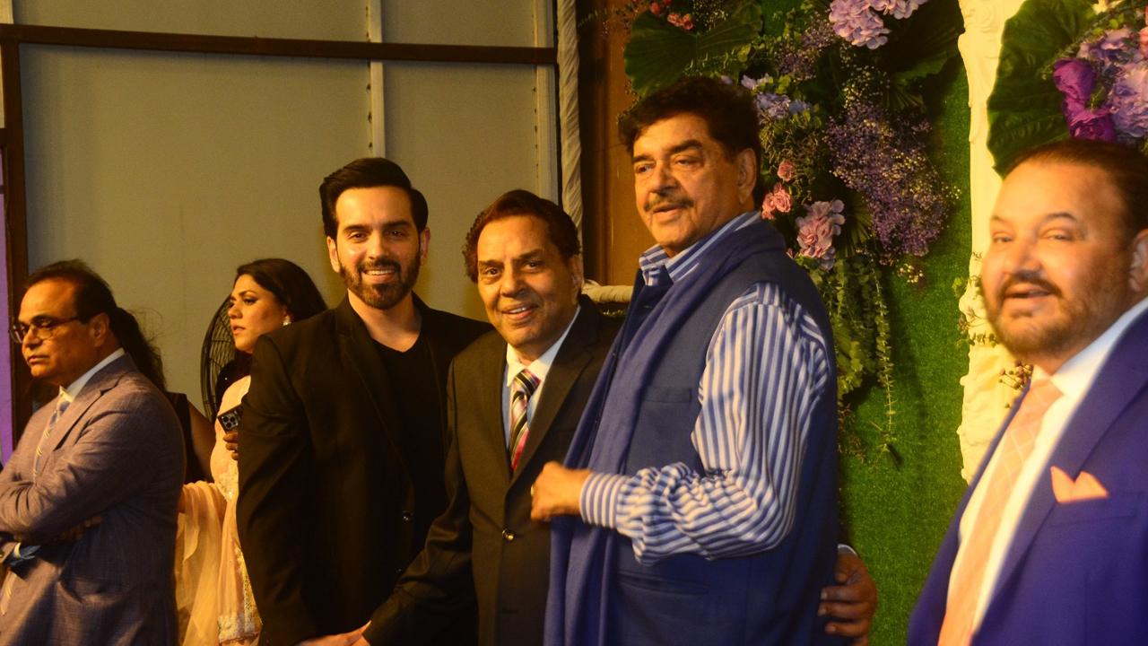 Shatrughan Sinha posed with his son Luv and the groom's grandfather, veteran actor Dharmendra.