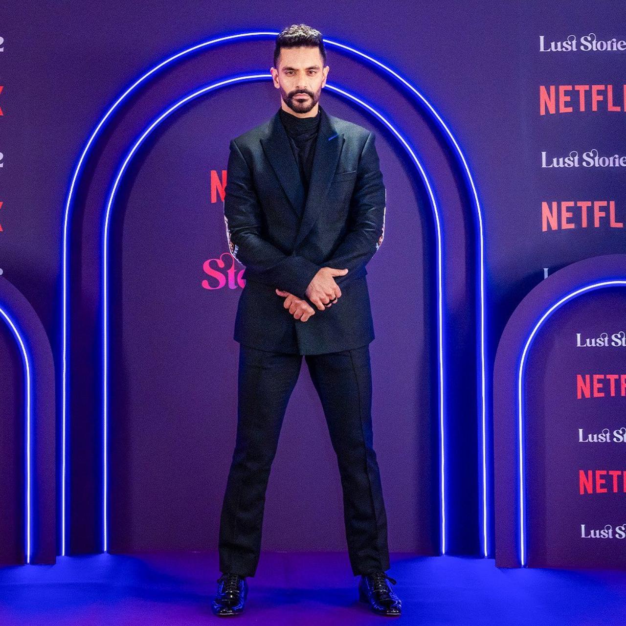 Angad Bedi looked dapper in an all-black suit. His pairing with Mrunal Thakur is one of the highlights of the anthology