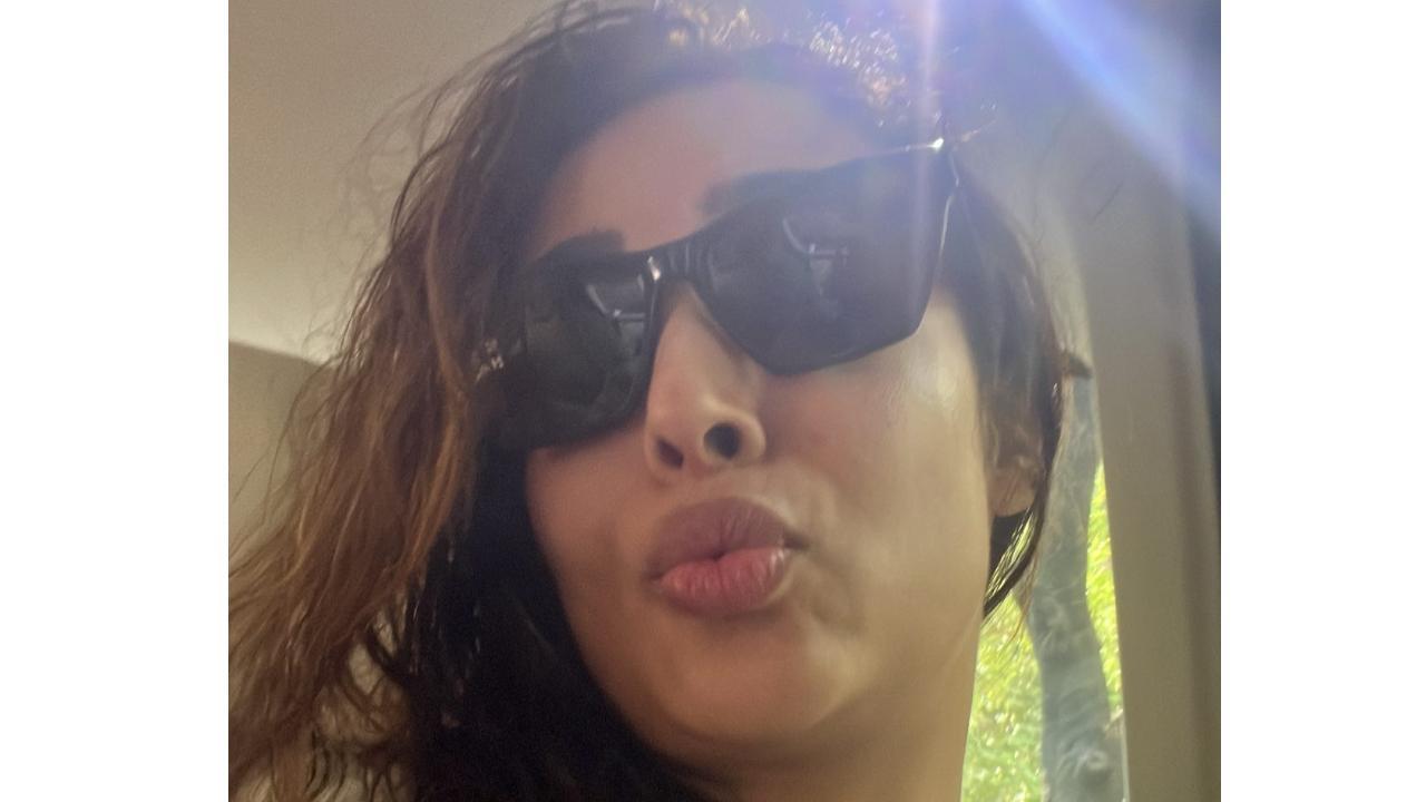 Malaika Arora shares 'happy face' selfie amid shoot in Bandra, check out