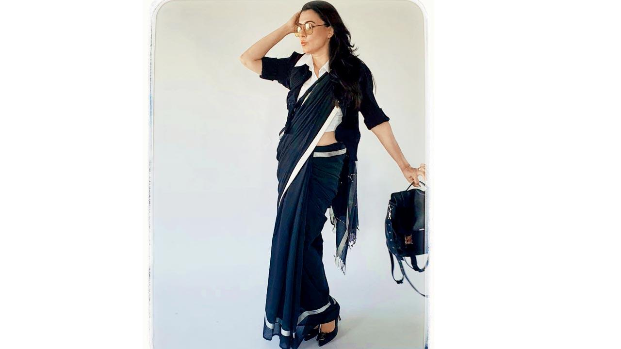 In the saree episode, Mathur wore a Raw Mango saree paired with a Cos blouse and YSL heels