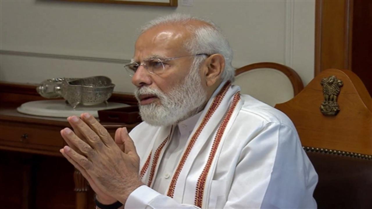 Prime Minister Narendra Modi on Monday said rescue teams were ensuring the safe evacuation of people living in vulnerable locations in the path of Cyclone Biparjoy, which is likely to make landfall in Gujarat's Kutch. Photos PTI/ANI