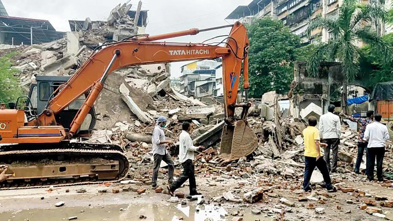 Three of the ‘highly dilapidated’ buildings are being demolished currently in Ulhasnagar. Pic/Navneet Barhate