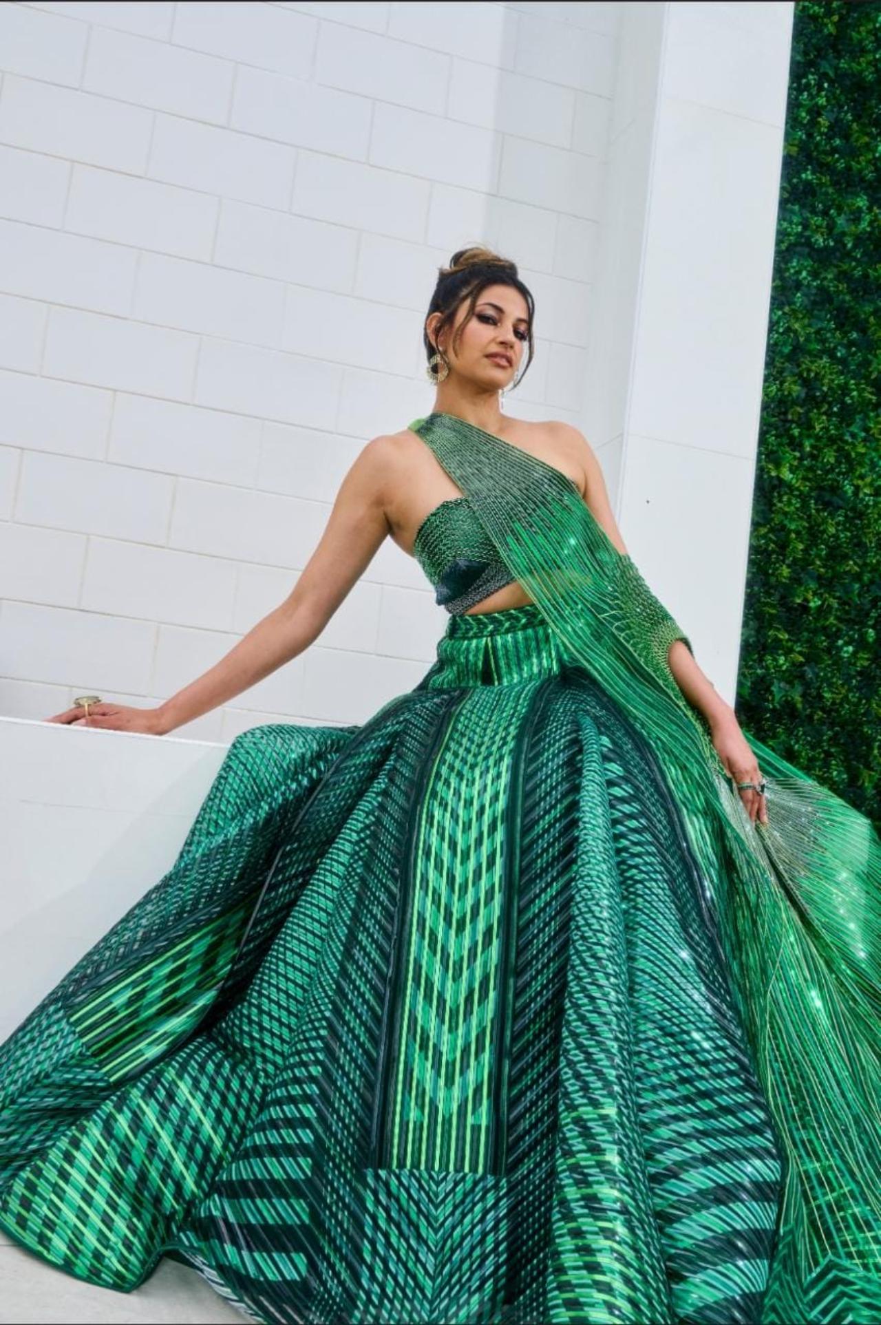 The theme of the premiere had a prom feel and Moorjani opted for a futuristic design lehenga from couturier Amit Aggarwal which has swoops of geometrical patterns