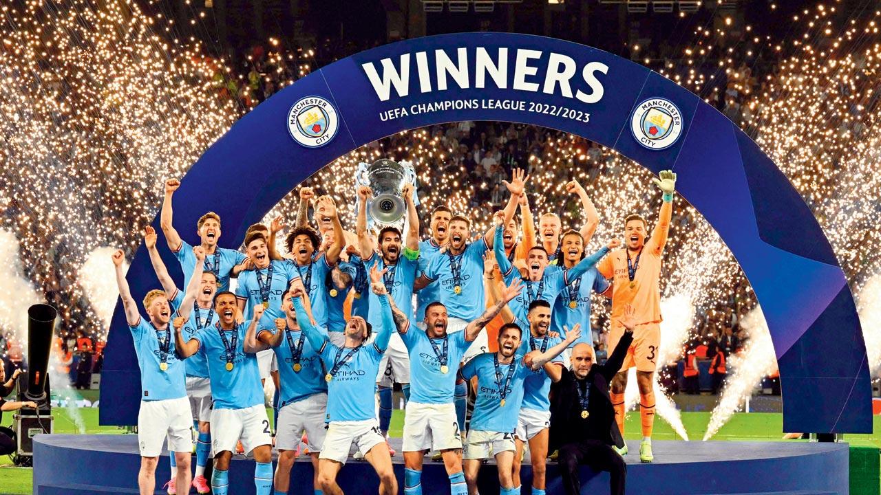 Man City skipper Ilkay Gundogan lifts the UCL trophy in Istanbul