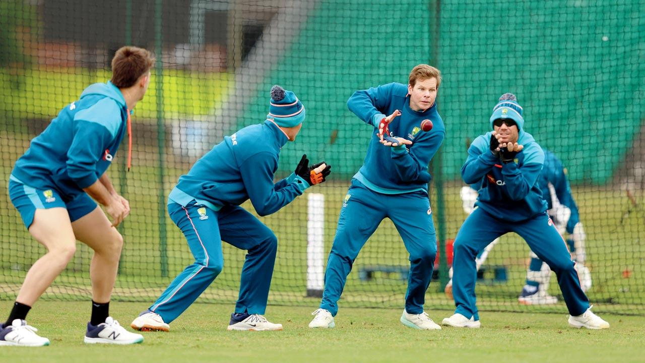 Steven Smith takes a catch during Australia’s practice session at Beckenham, England, yesterday