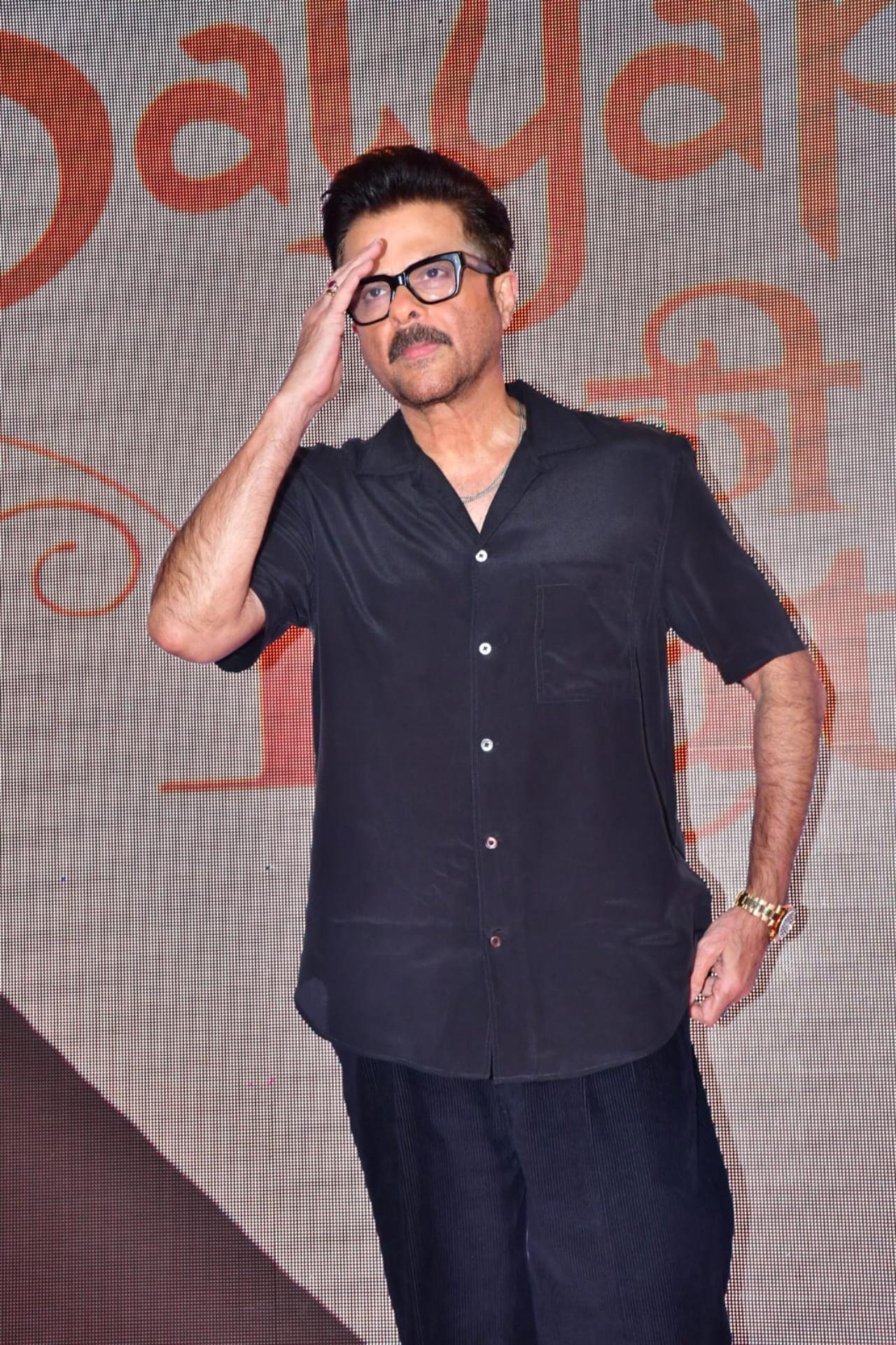 Anil Kapoor greeted the paps with a salute as he arrived for the screening dressed in an all-black outfit