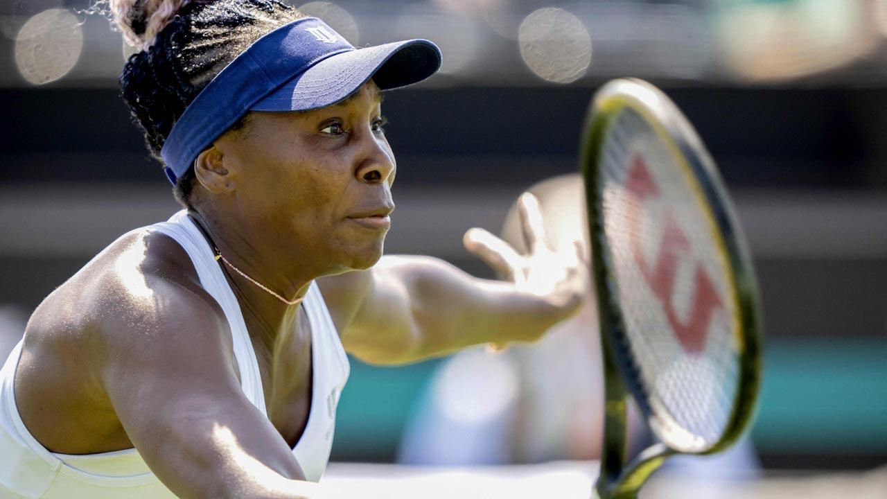 Venus Williams crashes out in opener with sister Serena watching from the stands