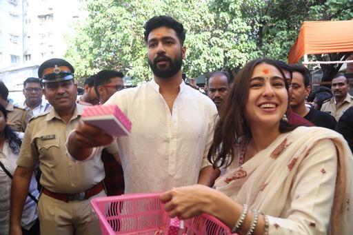Sara Ali Khan and Vicky Kaushal also distributed sweets among the waiting media and fans (Photo: Yogen Shah)