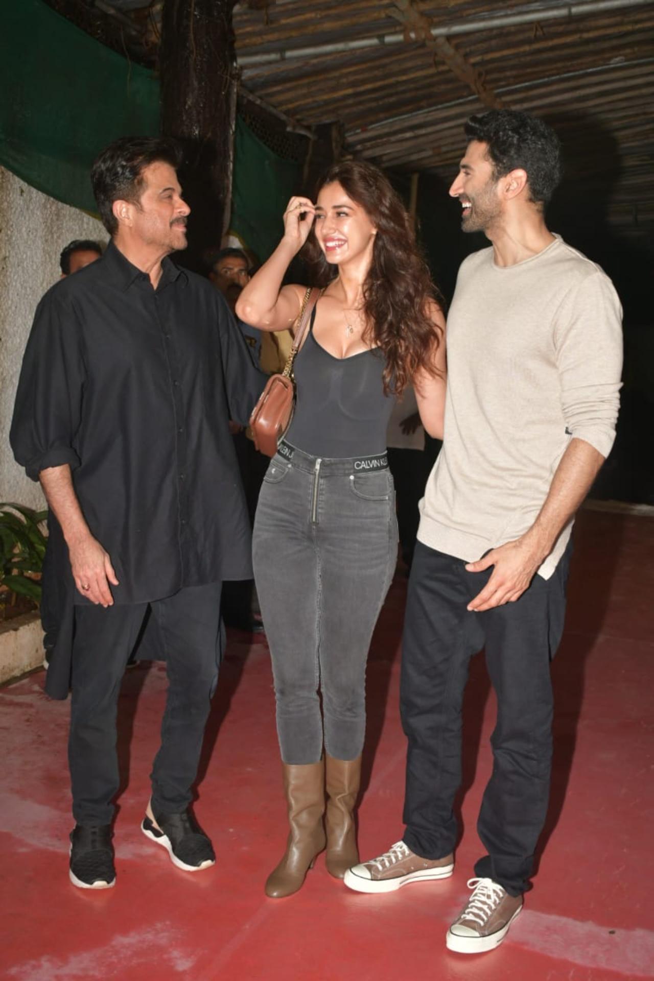 A Malang reunion! Disha Patani hung out with her Malang co-stars Aditya Roy Kapur and Anil Kapoor and the trio could not stop laughing and chatting. Do we smell a sequel?