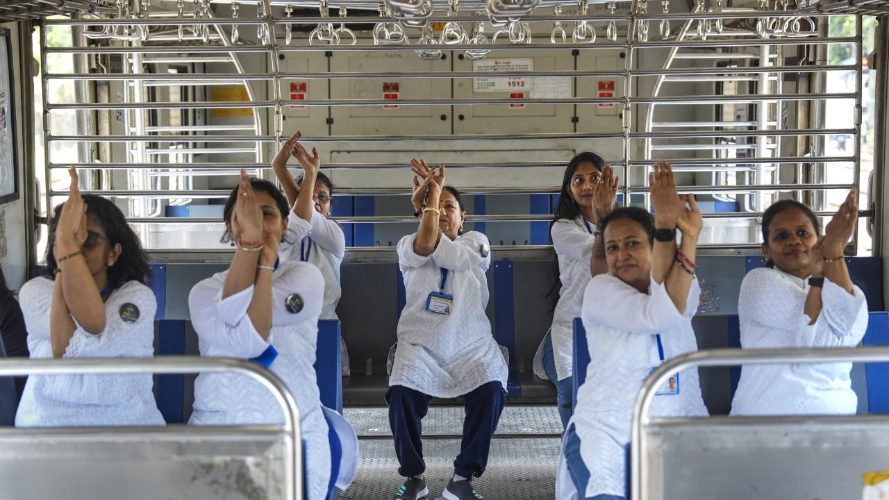 International Yoga Day 2023: Passengers, railway employees perform Yoga at Mumbai Central Station