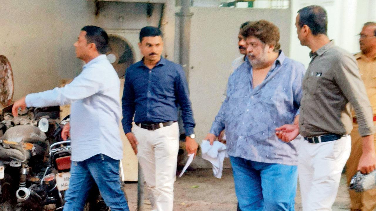 Anil Jaisinghani in the custody of Mumbai Crime Branch officers