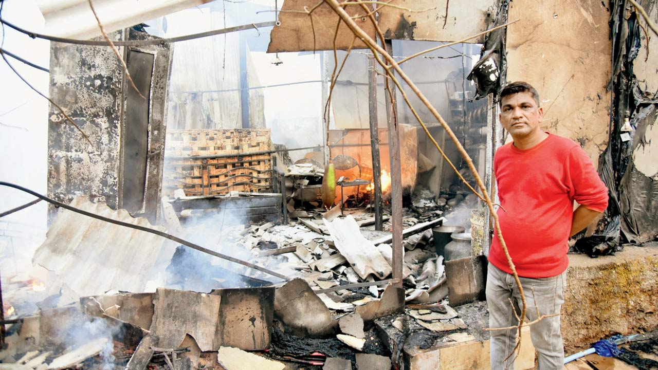 Bapu Santish Borade said he lost all his belongings, but his wife and son are safe. Pics/Sameer Markande